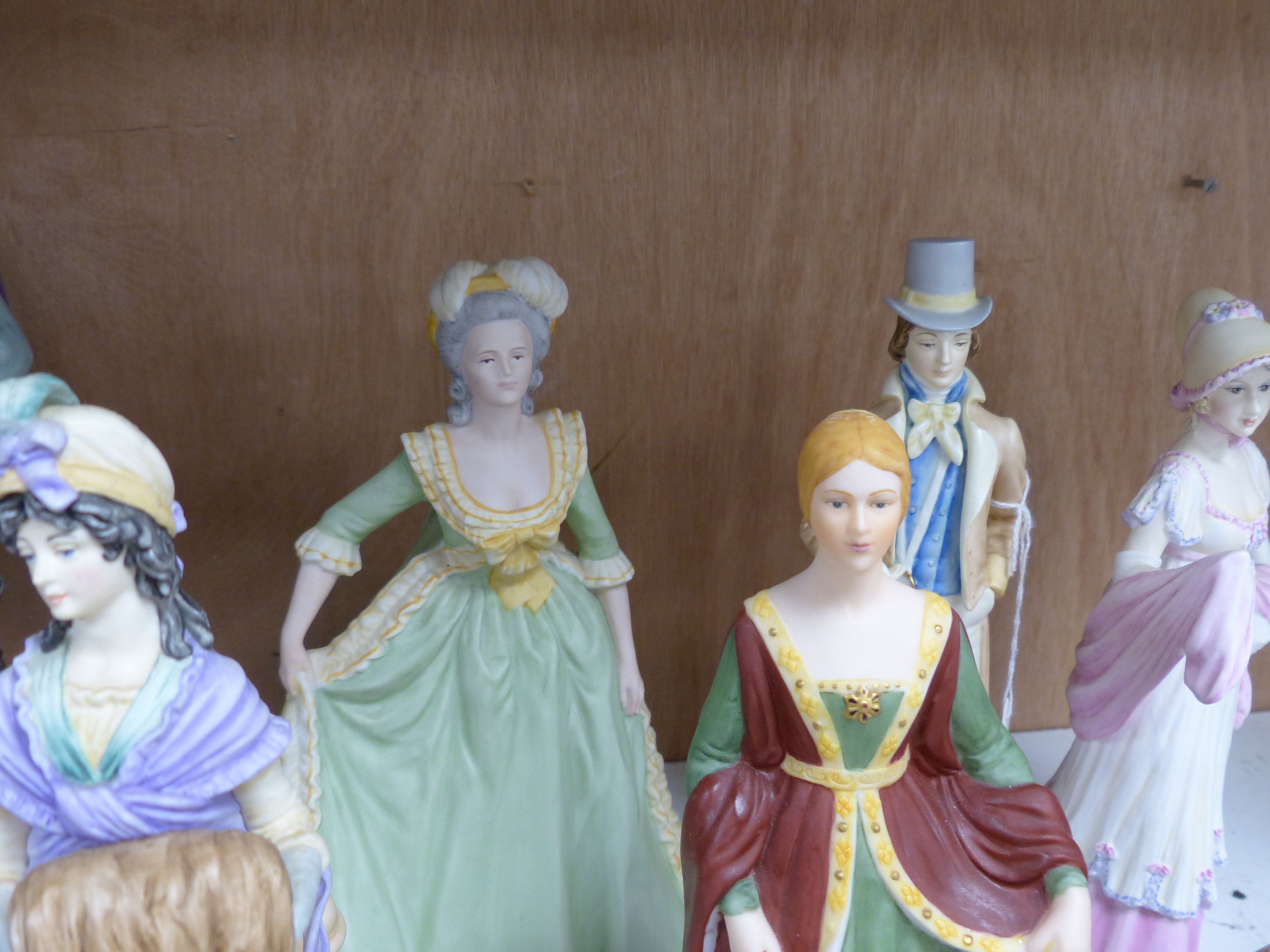 Ten various ceramic figurines by Coalport, Royal Worcester, Franklin Mint and others